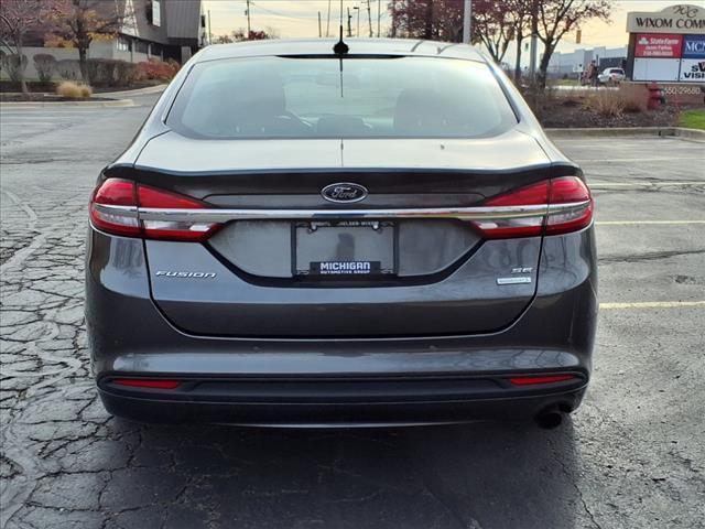 used 2018 Ford Fusion car, priced at $11,856