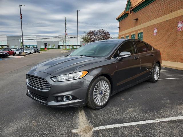 used 2016 Ford Fusion car, priced at $15,201