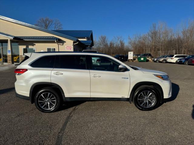 used 2019 Toyota Highlander Hybrid car, priced at $31,699