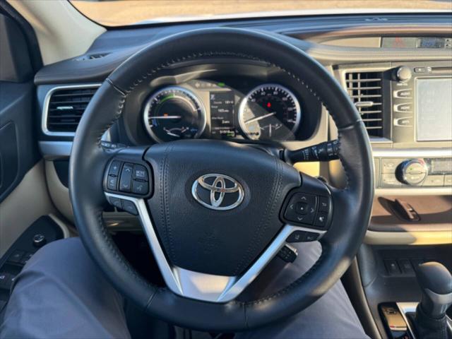 used 2019 Toyota Highlander Hybrid car, priced at $31,699