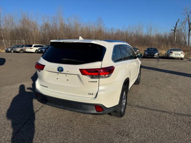 used 2019 Toyota Highlander Hybrid car, priced at $31,699