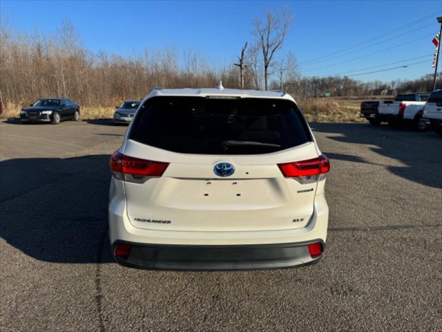 used 2019 Toyota Highlander Hybrid car, priced at $31,699