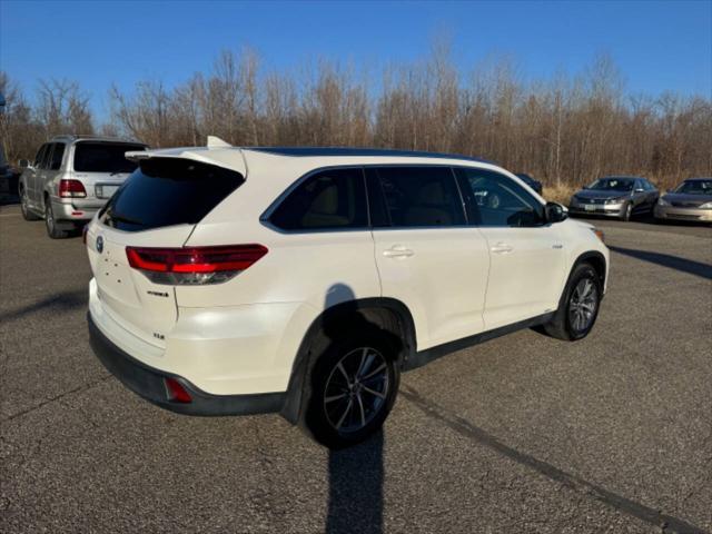 used 2019 Toyota Highlander Hybrid car, priced at $31,699