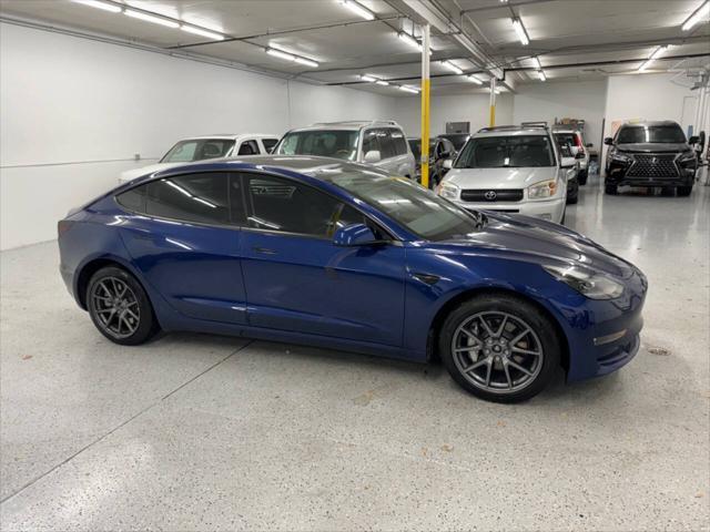 used 2023 Tesla Model 3 car, priced at $32,599