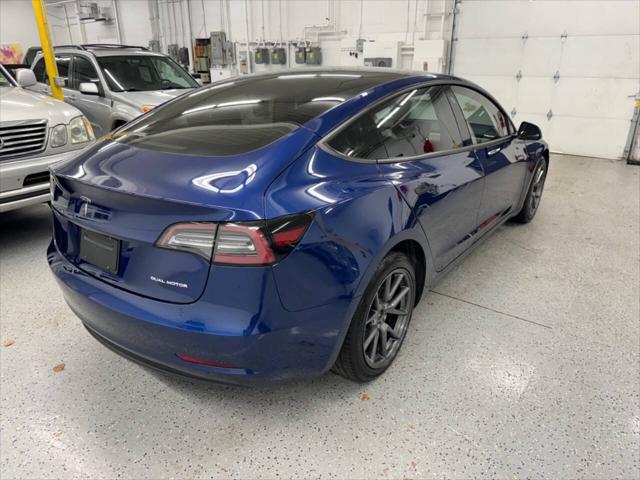 used 2023 Tesla Model 3 car, priced at $32,599