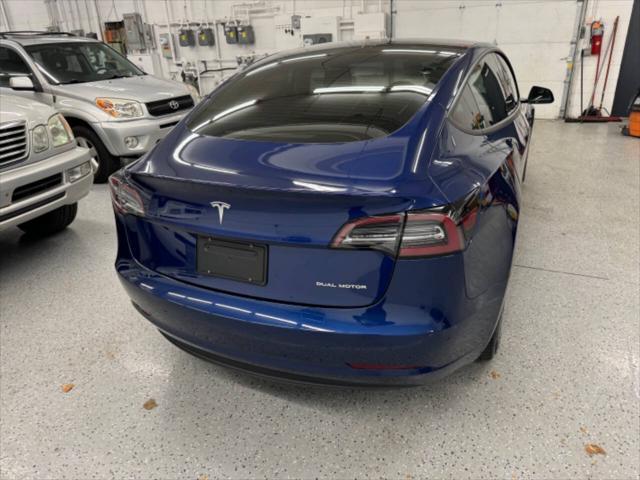 used 2023 Tesla Model 3 car, priced at $32,599