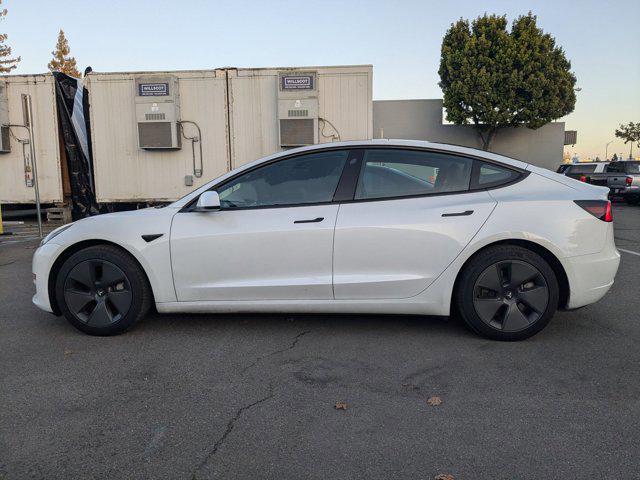 used 2023 Tesla Model 3 car, priced at $27,877