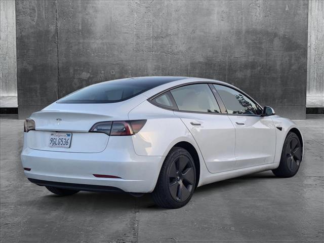 used 2023 Tesla Model 3 car, priced at $27,877