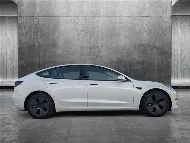 used 2023 Tesla Model 3 car, priced at $27,877