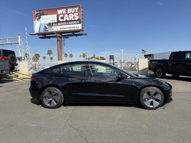 used 2023 Tesla Model 3 car, priced at $29,995