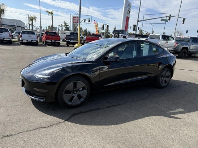 used 2023 Tesla Model 3 car, priced at $29,995