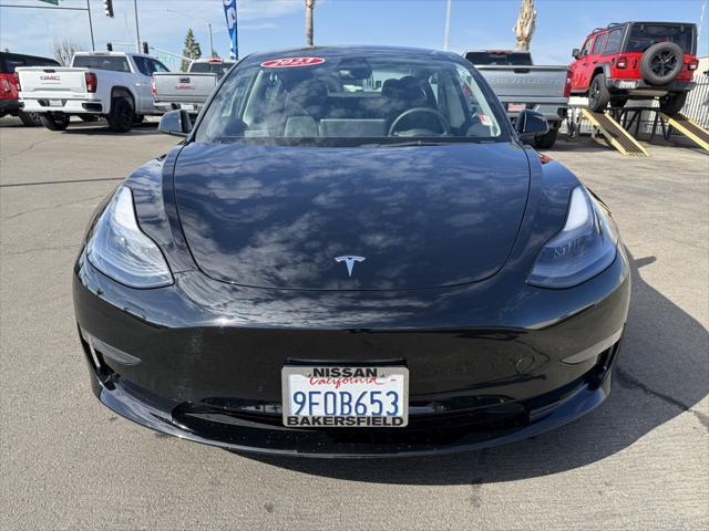 used 2023 Tesla Model 3 car, priced at $29,995