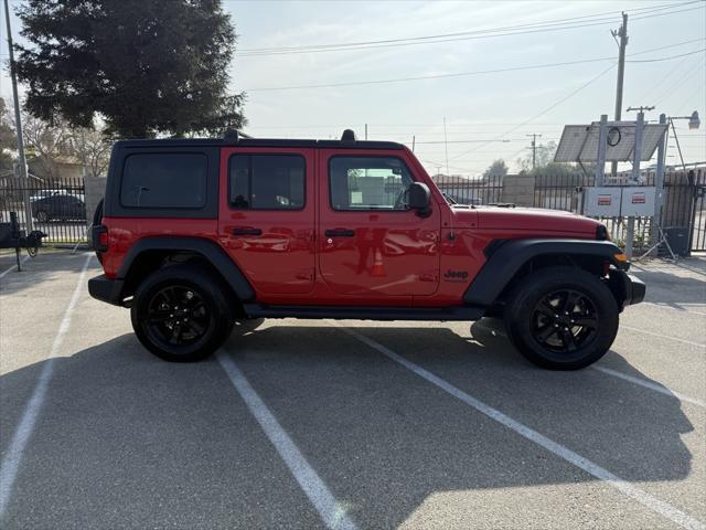 used 2021 Jeep Wrangler Unlimited car, priced at $31,495