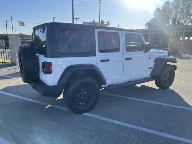 used 2021 Jeep Wrangler Unlimited car, priced at $32,988