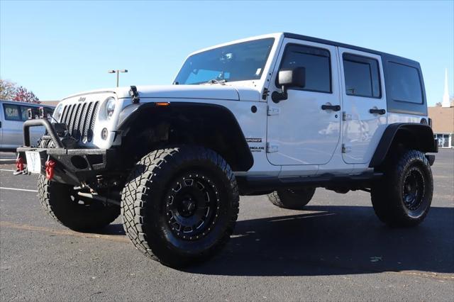 used 2014 Jeep Wrangler Unlimited car, priced at $18,999