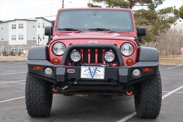 used 2012 Jeep Wrangler Unlimited car, priced at $16,999