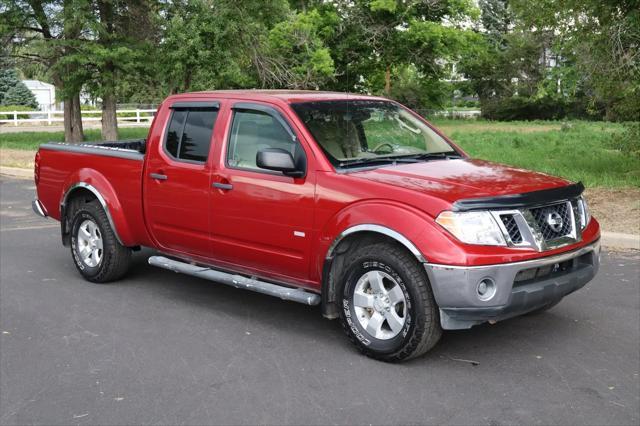 used 2010 Nissan Frontier car, priced at $14,999