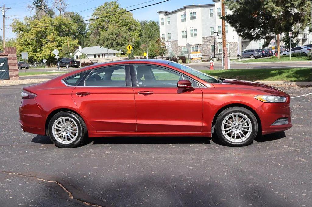 used 2014 Ford Fusion car, priced at $7,999