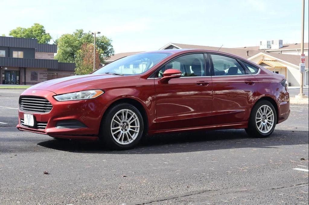 used 2014 Ford Fusion car, priced at $7,999