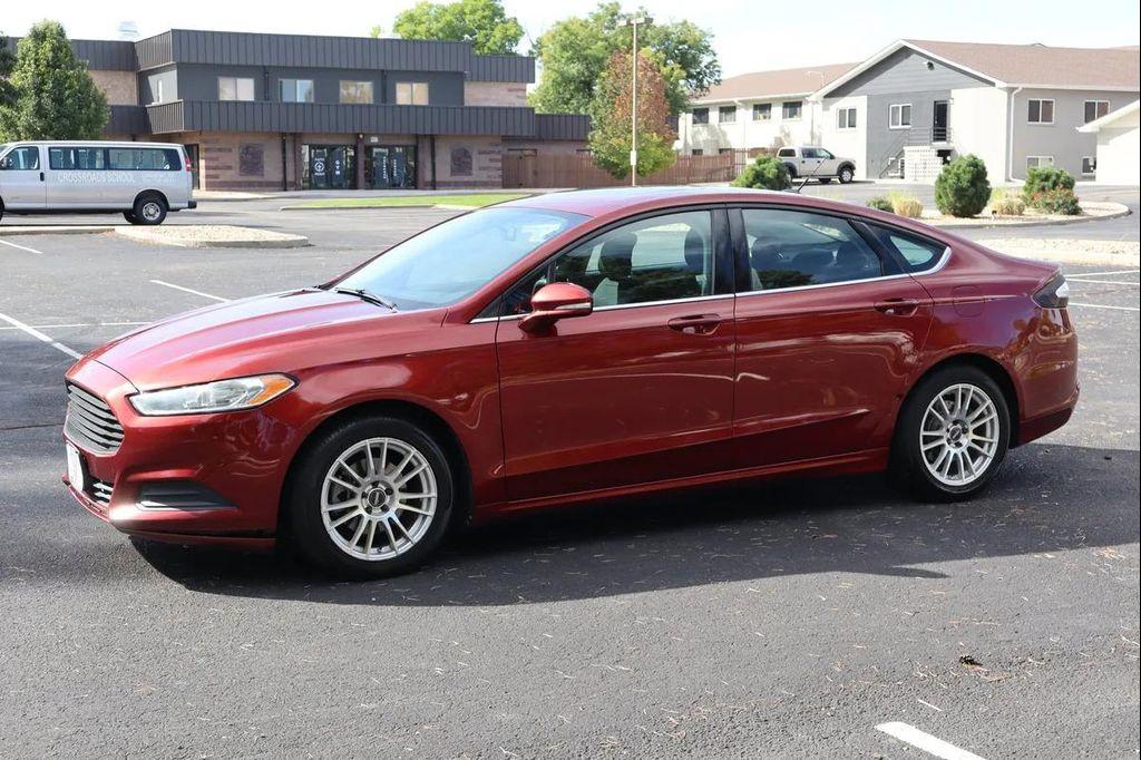 used 2014 Ford Fusion car, priced at $7,999