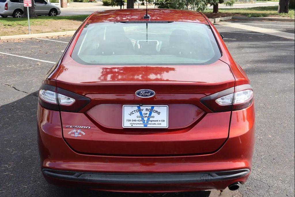 used 2014 Ford Fusion car, priced at $7,999