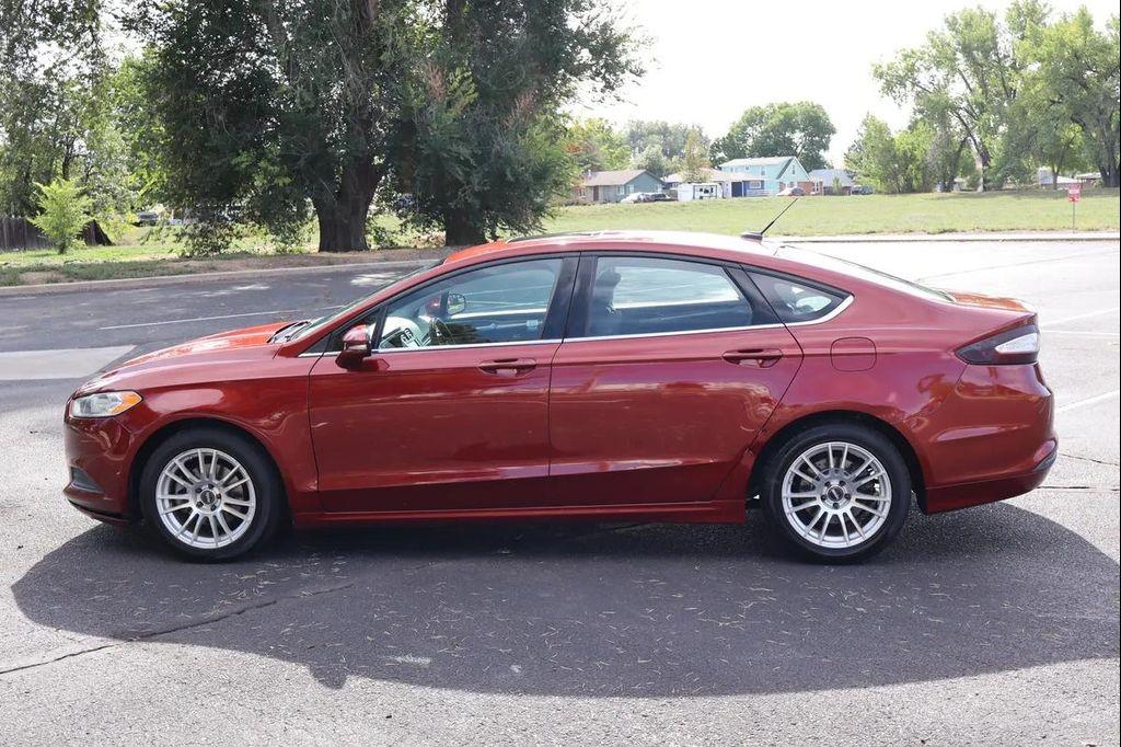 used 2014 Ford Fusion car, priced at $7,999