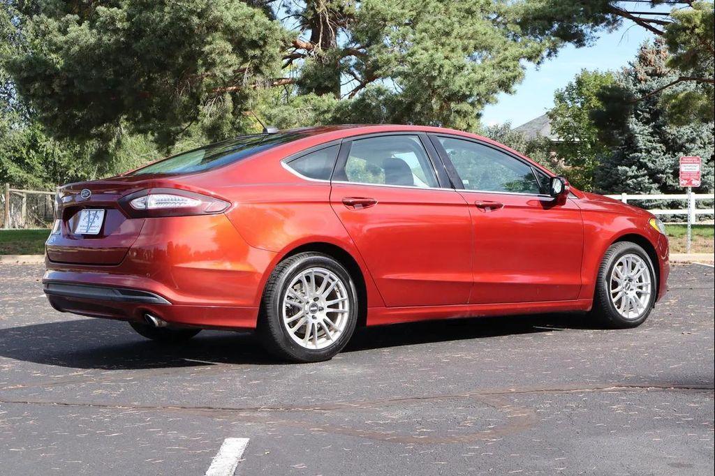 used 2014 Ford Fusion car, priced at $7,999