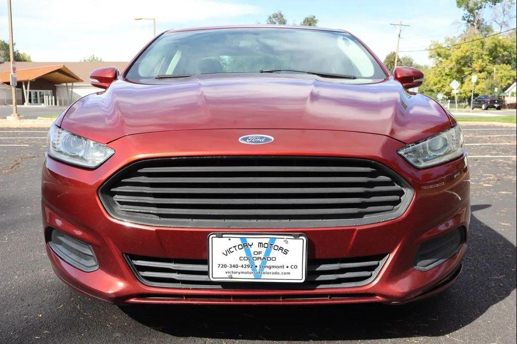 used 2014 Ford Fusion car, priced at $7,999