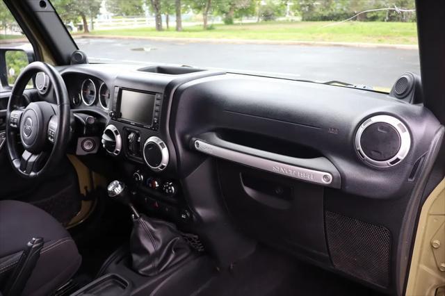 used 2013 Jeep Wrangler Unlimited car, priced at $17,999