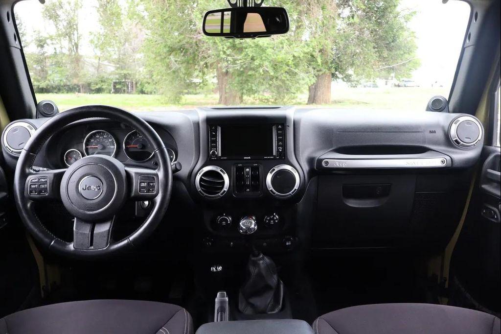 used 2013 Jeep Wrangler Unlimited car, priced at $15,999