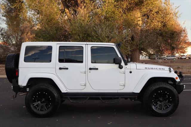 used 2014 Jeep Wrangler Unlimited car, priced at $14,999