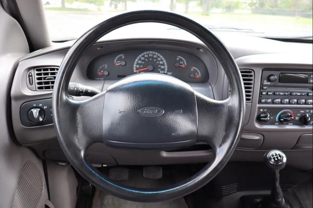 used 1999 Ford F-150 car, priced at $5,999