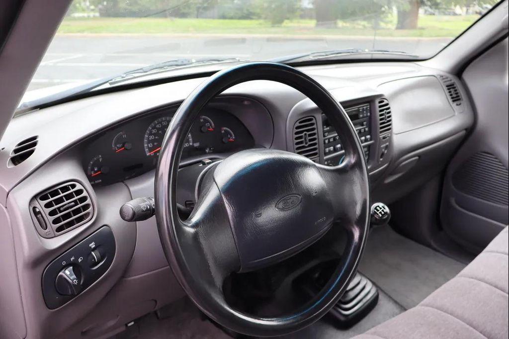 used 1999 Ford F-150 car, priced at $5,999