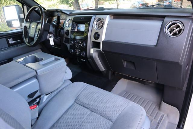 used 2014 Ford F-150 car, priced at $13,999