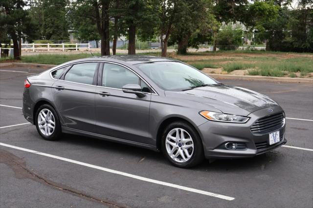 used 2014 Ford Fusion car, priced at $7,999