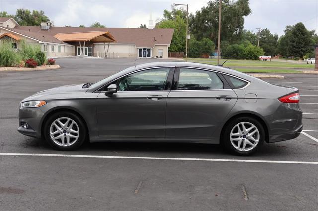 used 2014 Ford Fusion car, priced at $7,999