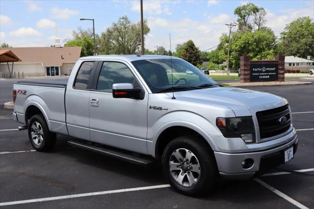used 2014 Ford F-150 car, priced at $14,999