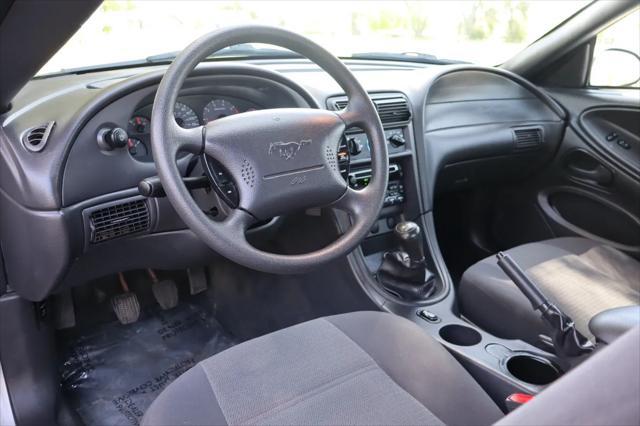 used 2001 Ford Mustang car, priced at $9,999
