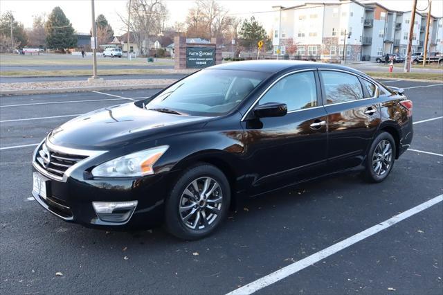 used 2015 Nissan Altima car, priced at $9,999