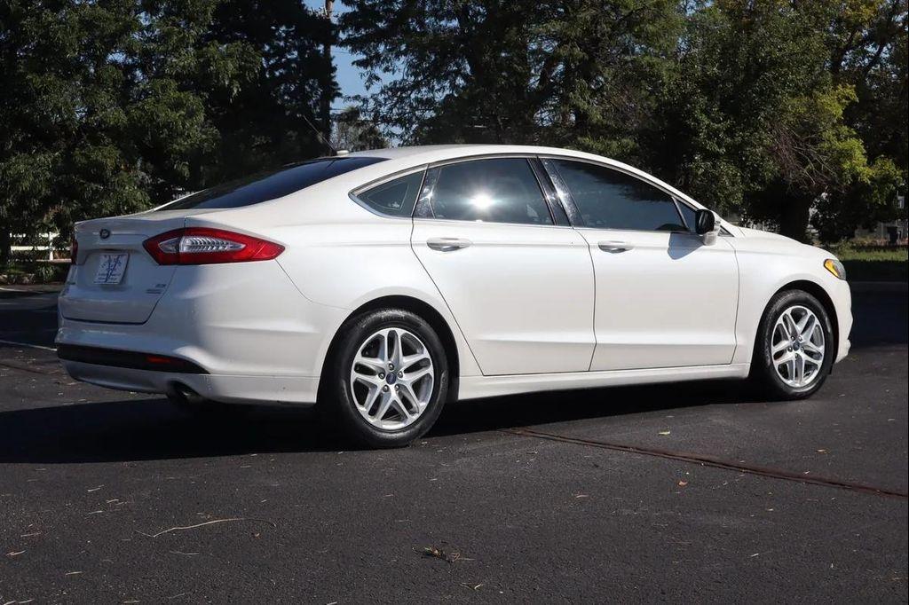 used 2014 Ford Fusion car, priced at $10,999