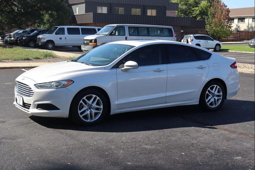 used 2014 Ford Fusion car, priced at $10,999