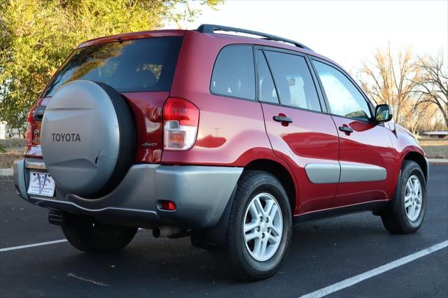 used 2002 Toyota RAV4 car, priced at $9,999