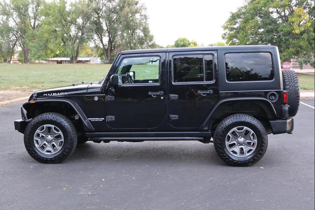 used 2013 Jeep Wrangler Unlimited car, priced at $17,999
