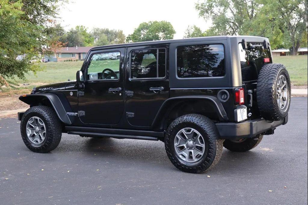 used 2013 Jeep Wrangler Unlimited car, priced at $17,999