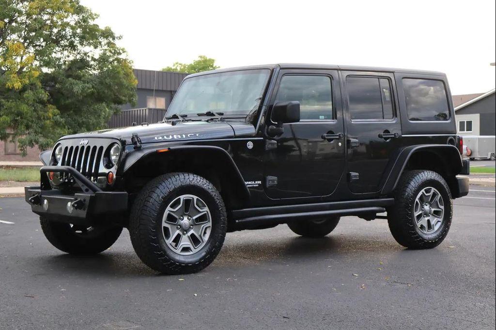 used 2013 Jeep Wrangler Unlimited car, priced at $17,999