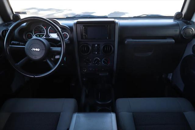 used 2010 Jeep Wrangler Unlimited car, priced at $14,999