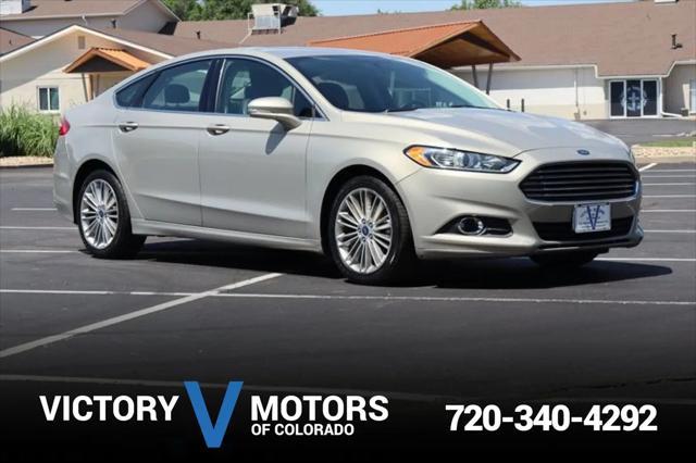 used 2015 Ford Fusion car, priced at $9,999