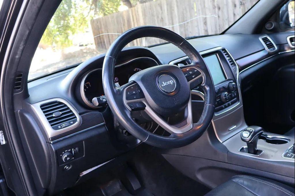 used 2015 Jeep Grand Cherokee car, priced at $9,999