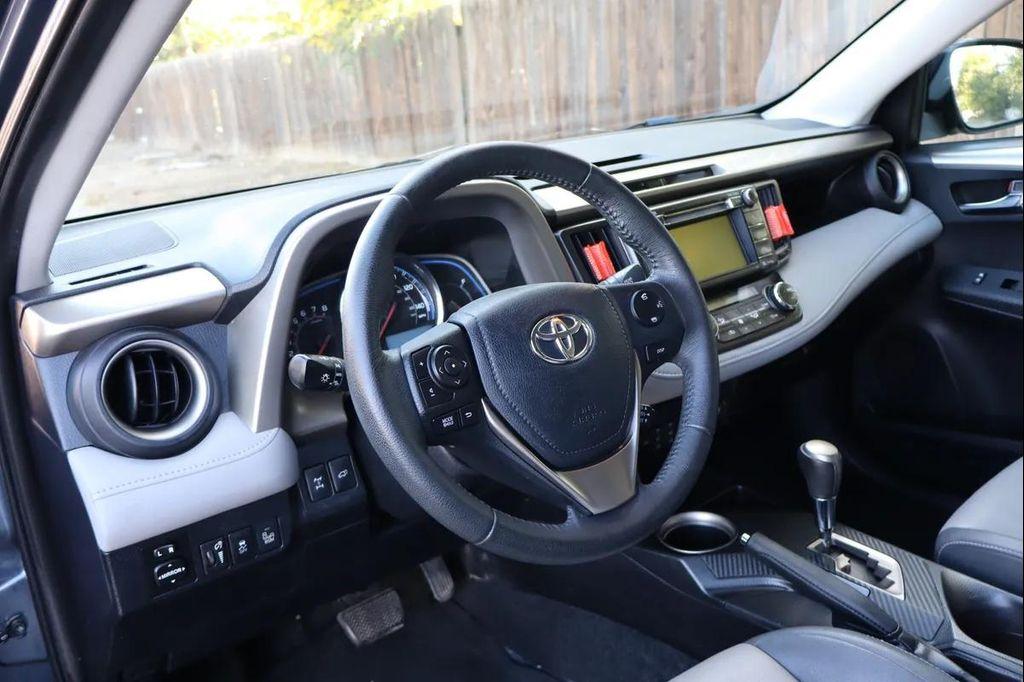 used 2013 Toyota RAV4 car, priced at $7,999