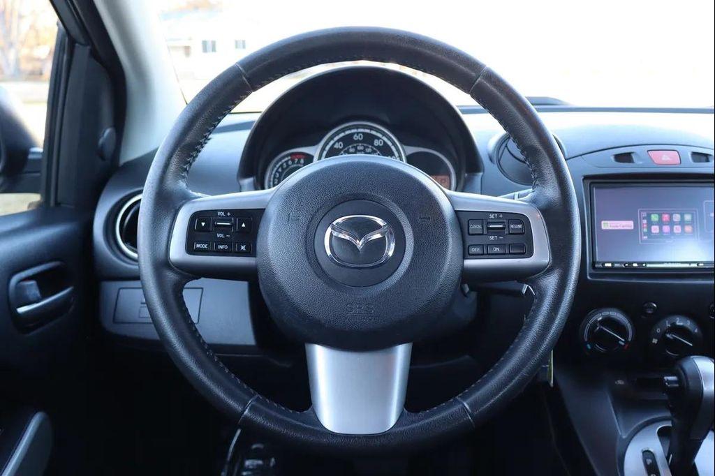 used 2012 Mazda Mazda2 car, priced at $5,999